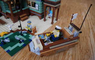 Набор LEGO Cathy&#39;s Fishing Lodge
