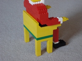 Набор LEGO Санта Клаус на стуле