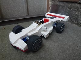 Набор LEGO Болид Формула 1 со станцией обслуживания