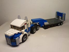 Набор LEGO Тягач с прицепом-платформой